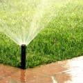 How Lawn Sprinkler Systems Impact Roofing and Foundation Health